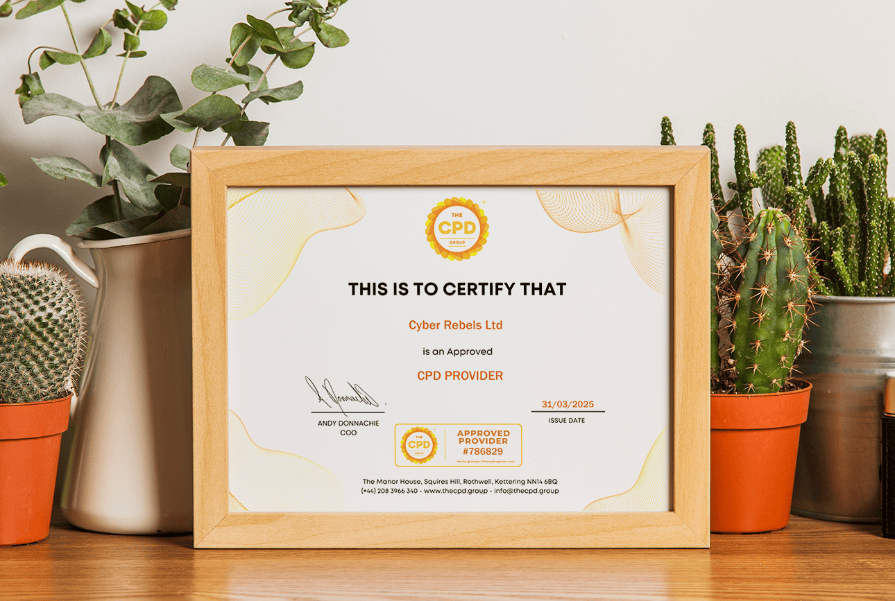 Certificate on a wooden shelf with plants.