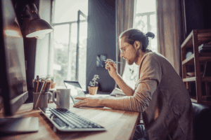 Man working at desk with computer