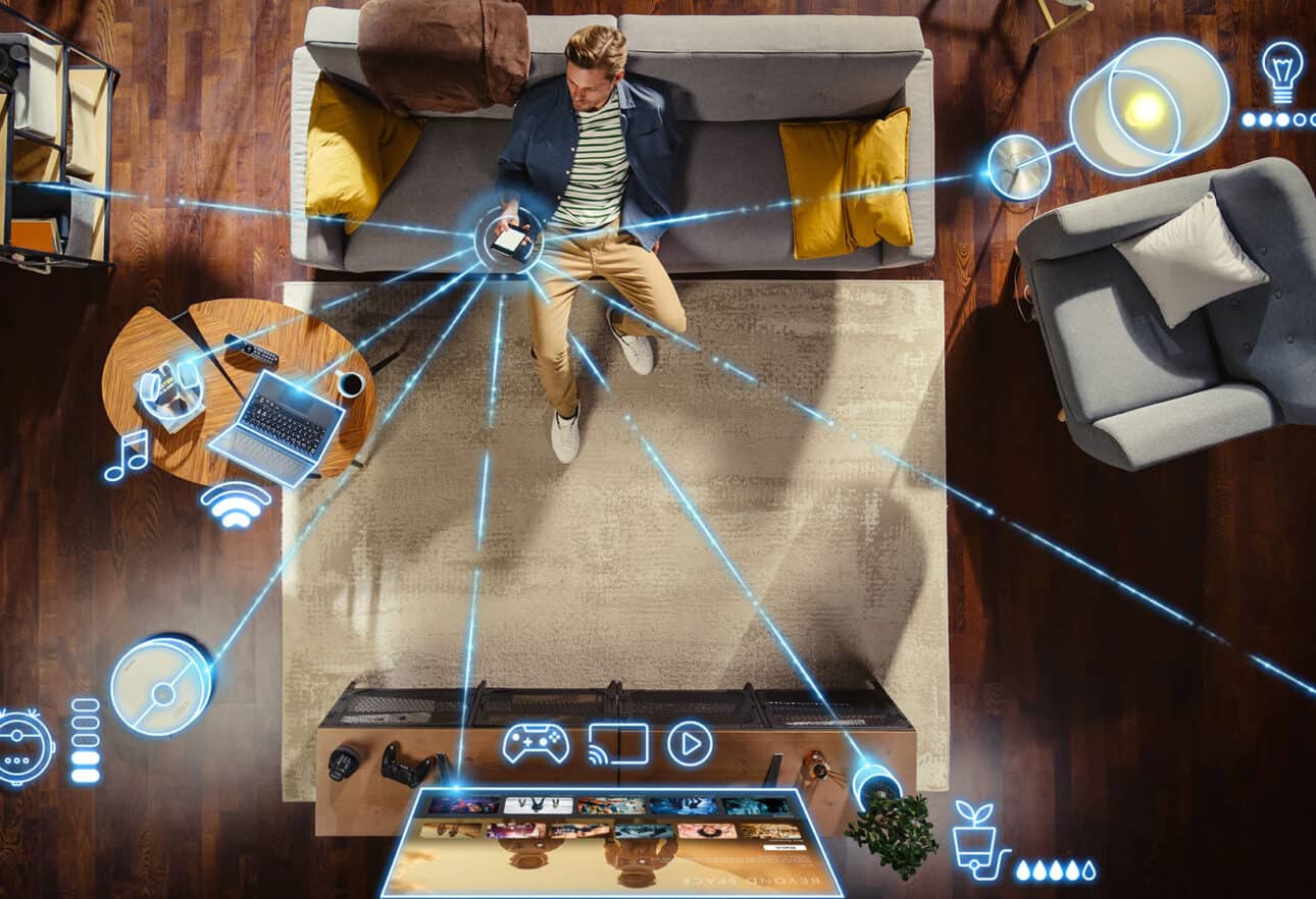 Man controlling smart home devices with phone.