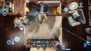 Man controlling smart home devices with phone.