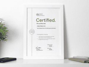 Certificate of Green Small Business achievement on shelf.