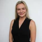 Person smiling in professional attire