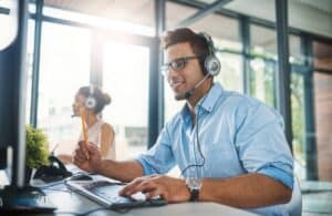 Call centre employee working at desk